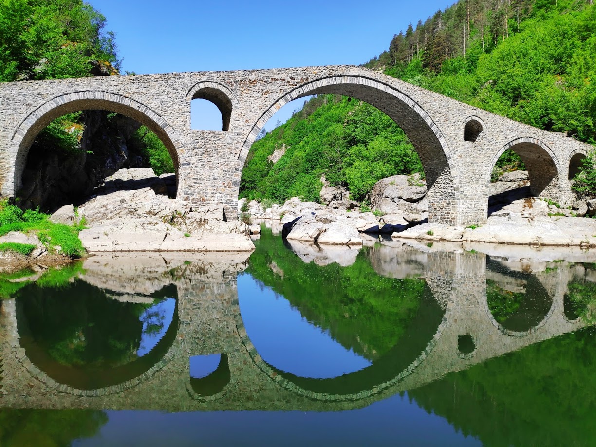 Devils bridge. The Devil’s bridge is an old Ottoman bridge, Constructed between 1515 and 1518 in the early 16th century, by a builder Dimitar. ‘’Dyavolski most’’ in Bulgarian or ‘’Sheytan Kyupriya’’ in Turkish, it’s the most stunning of the humpbacked bridges that cross the Arda River in Bulgaria. It was built over a demolished Roman bridge and cuts from the steep slopes of the Rhodope Mountains along an ancient road linking the Aegean Sea and the Northern Thracian Valley / Gornotrakiyskata Nizina /.